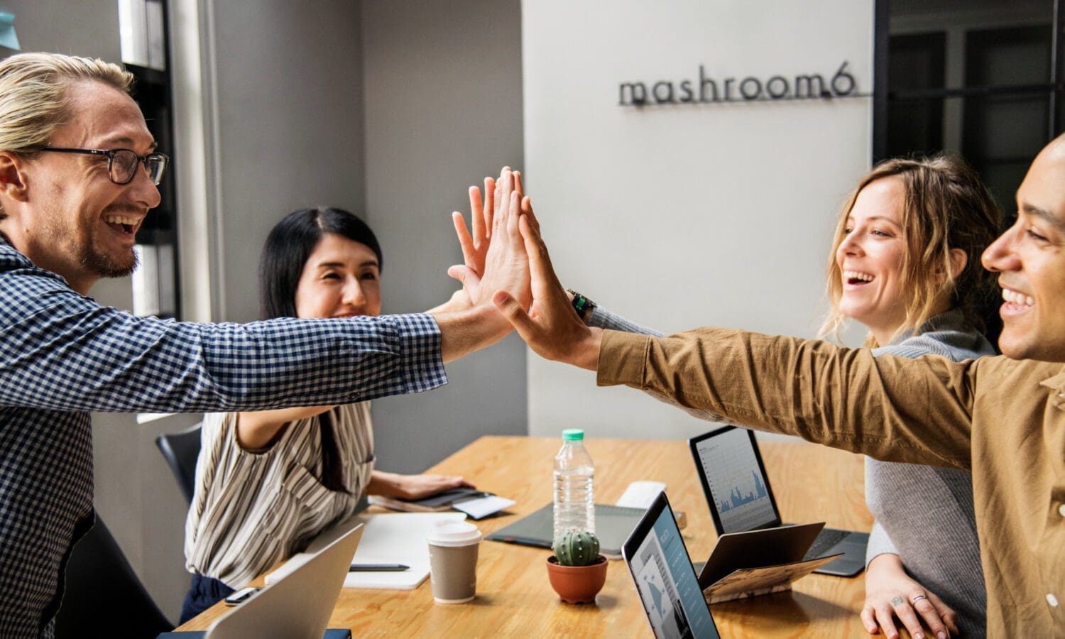 a team of business people celebrating success story